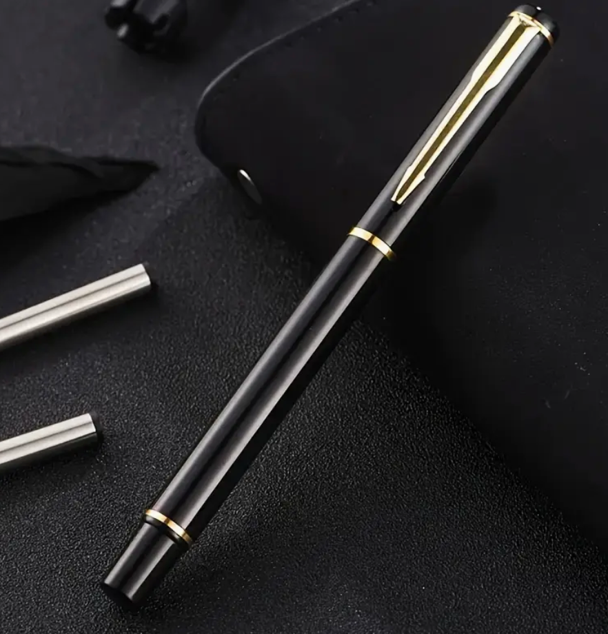 Black and gold metal ballpoint pen with detachable cap shown closed and open for writing