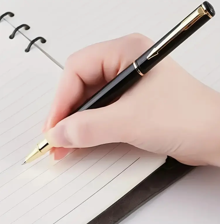 Black and gold metal ballpoint pen with detachable cap shown closed and open for writing
