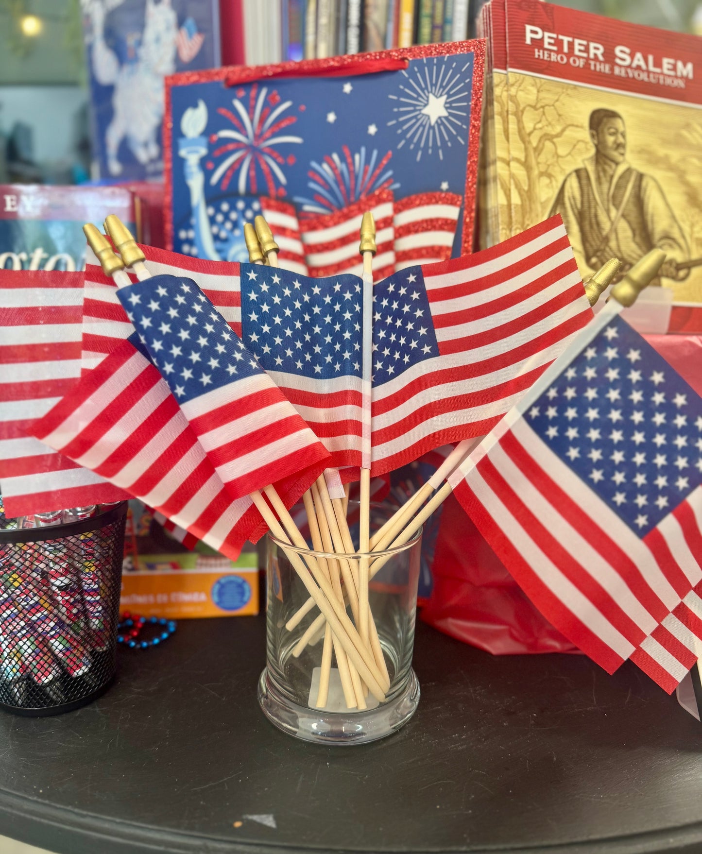 Mini American flag measuring 4x6 inches on a plastic stick, ideal for patriotic events and celebrations