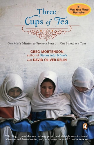 Cover of Three Cups of Tea by Greg Mortenson and David Oliver Relin, featuring three girls in white headscarves reading together against a textured wall.