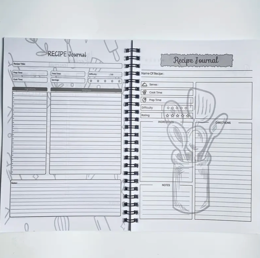 Recipe journal with spiral binding on a white background