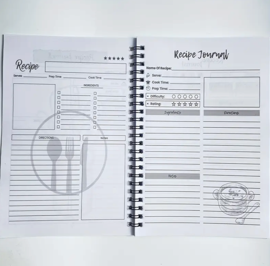 Recipe journal with spiral binding on a white background