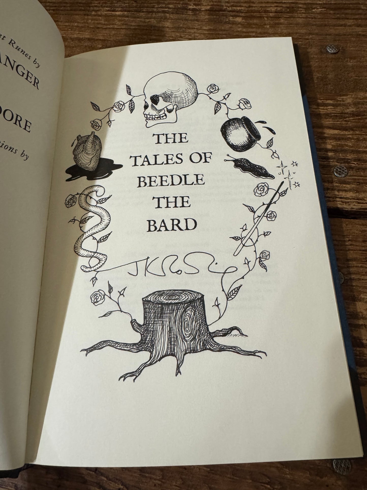 Cover of The Tales of Beedle the Bard by J.K. Rowling, showcasing an elegant and whimsical design, with an embossed illustration of a magical storybook surrounded by enchanting details.