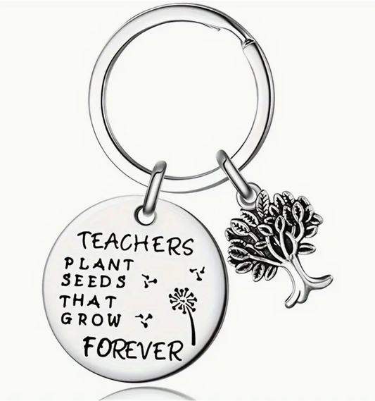 Metal keychain engraved with the phrase Teachers Plant Seeds That Grow Forever—a meaningful and lasting gift for educators.