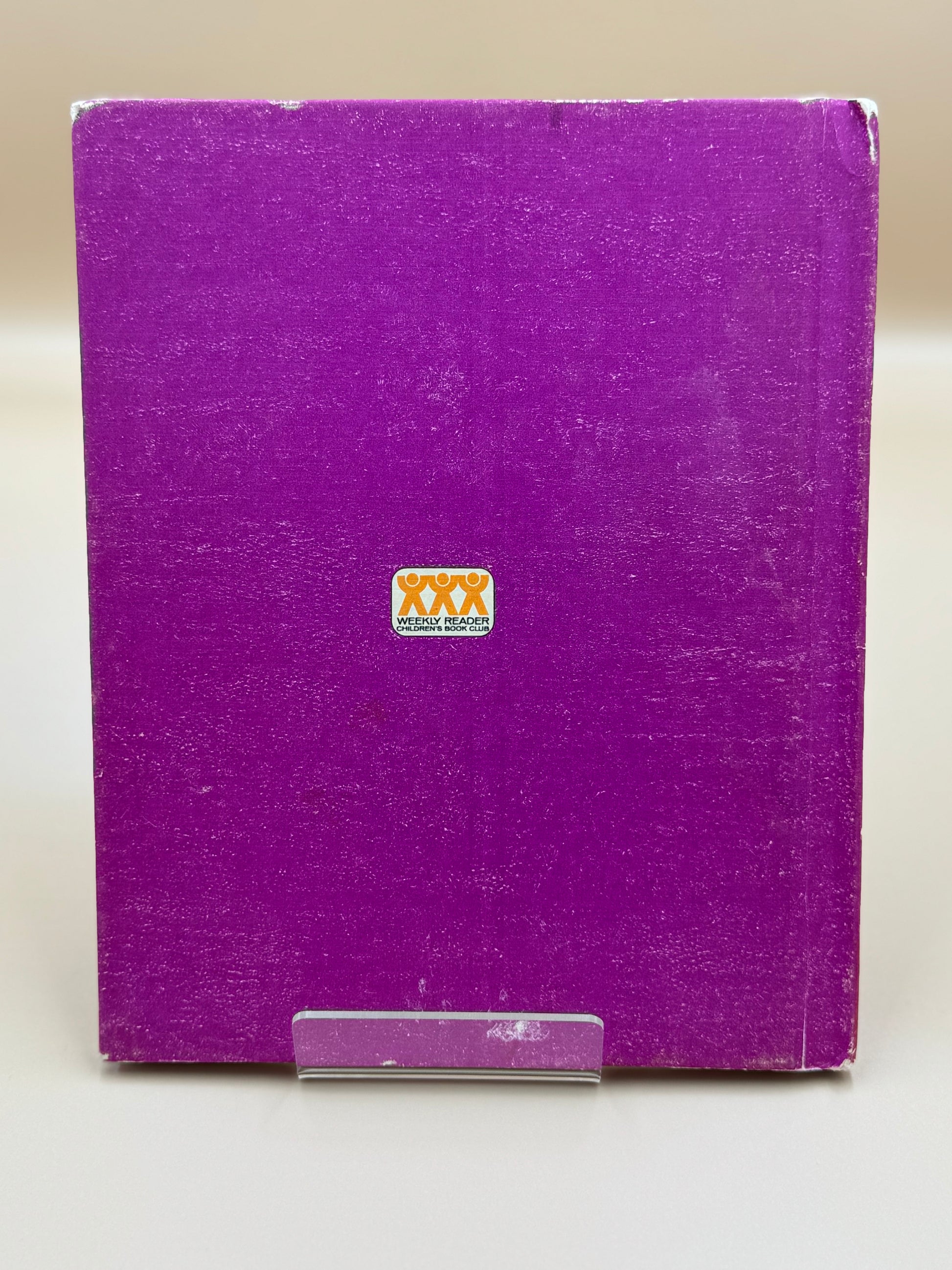 Purple box with a logo on a white background