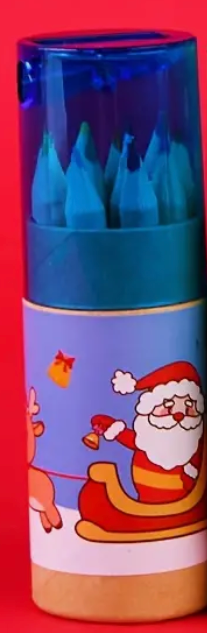 Travel-sized Christmas-themed colored pencils for kids with a built-in sharpener, featuring festive designs and vibrant colors.