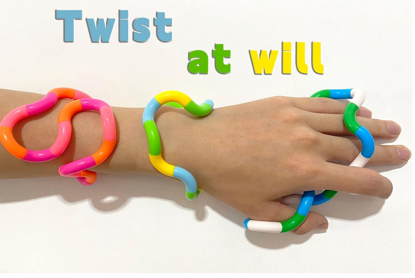 Multicolored twisty fidget toys shown in various shapes and color combinations, designed for sensory play and stress relief
