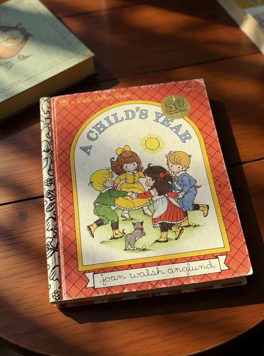 Front cover of A Child’s Year Little Golden Book by Enid Blyton featuring seasonal illustrations of children at play
