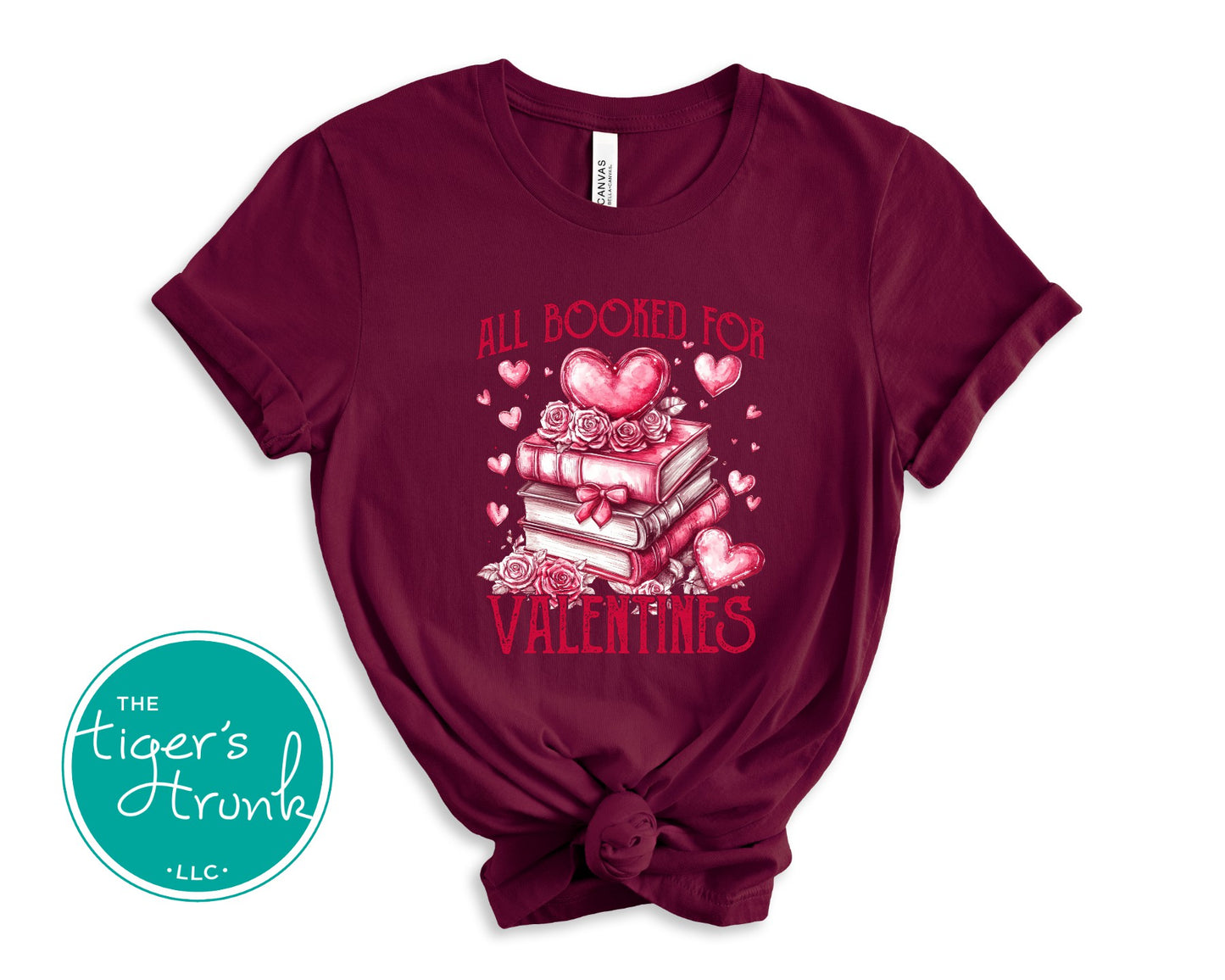 Book lover Valentine’s shirt with stacked books, hearts, and roses, featuring the phrase "All Booked for Valentine’s."