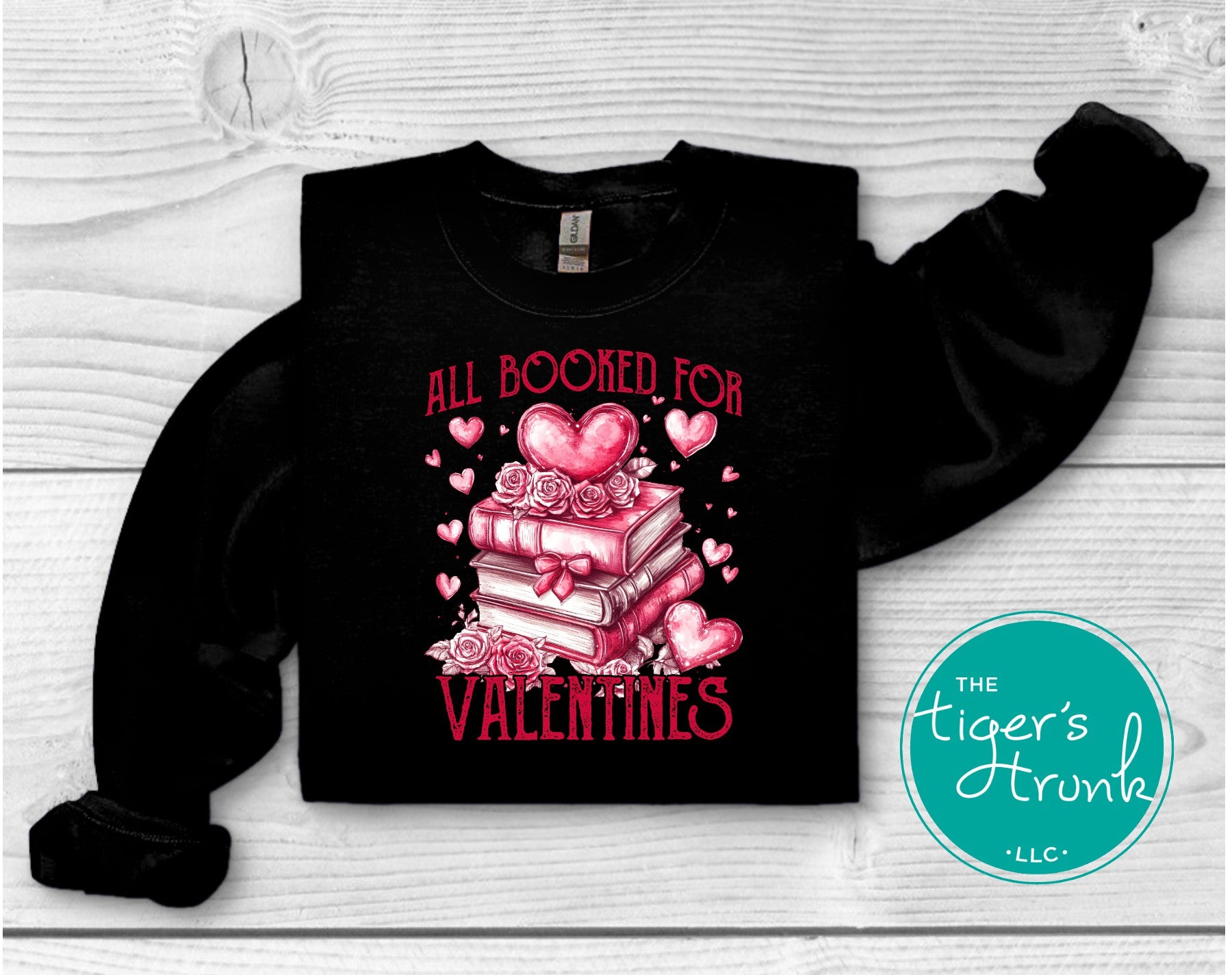 Book lover Valentine’s shirt with stacked books, hearts, and roses, featuring the phrase "All Booked for Valentine’s."