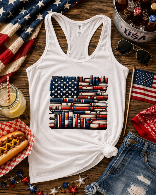 White women's racerback tank featuring an American flag made from stacked red, white, and blue books for patriotic book lovers.