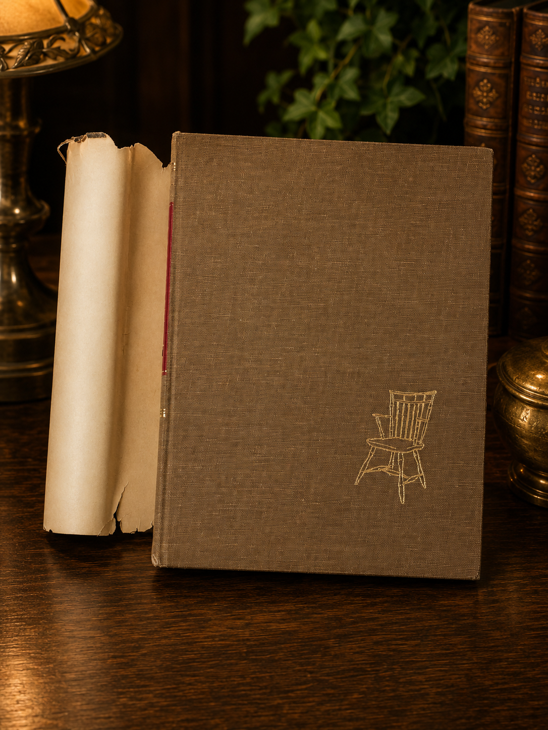 Decorative cloth cover of American Furniture featuring chair illustration.