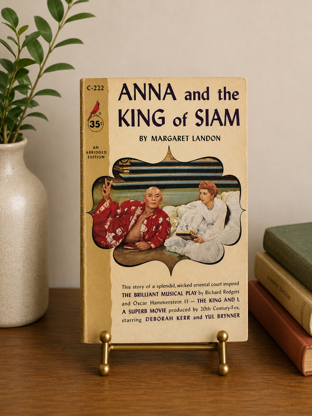 Vintage 1956 Cardinal edition paperback of Anna and the King of Siam by Margaret Landon featuring movie tie-in cover artwork