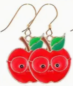 Red apple-shaped earrings with green leaves on a white background