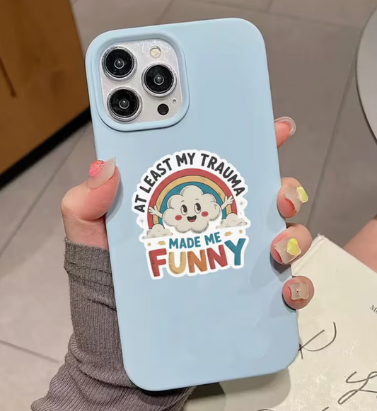 At Least My Trauma Made Me Funny 3-inch sticker with smiling cloud and retro rainbow