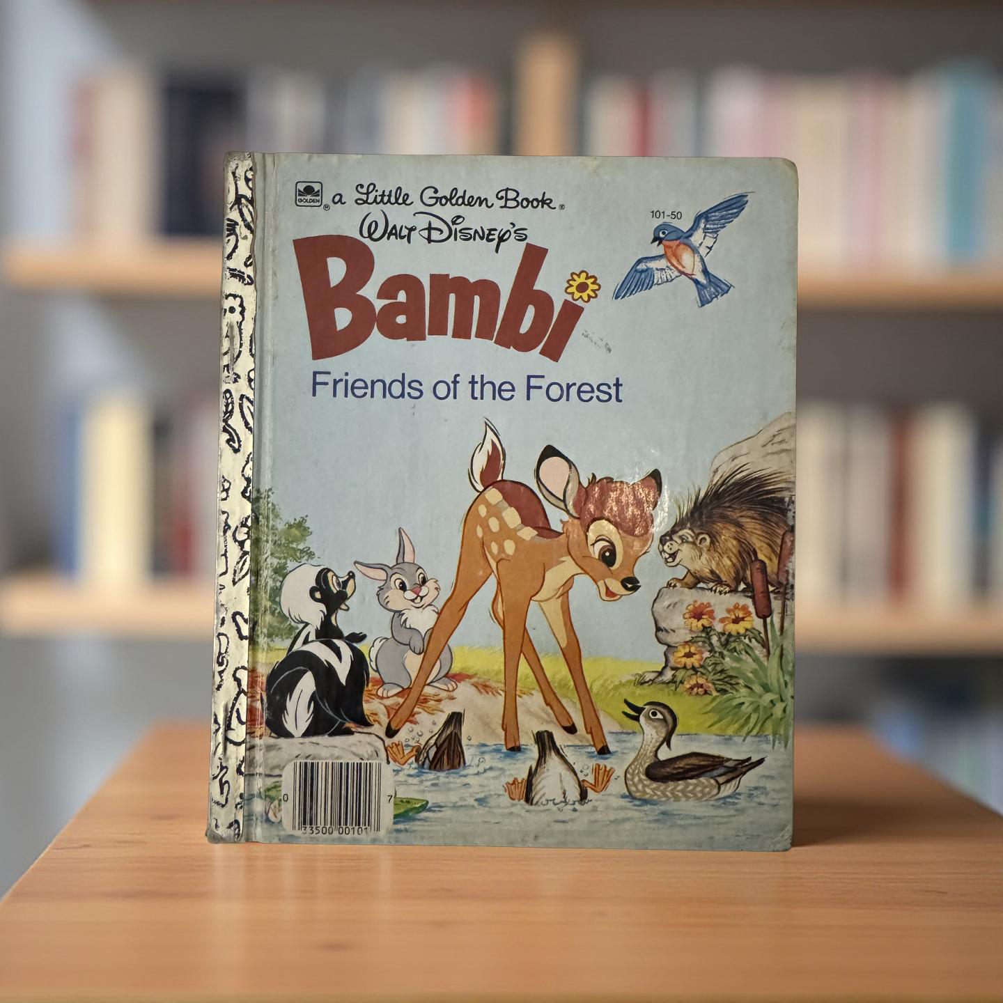 Front cover of Bambi Little Golden Book adapted by Bob Grant with classic Disney forest illustrations