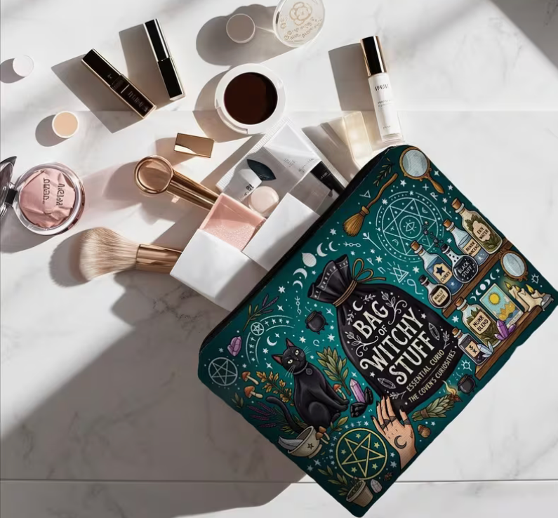 Basic Witch Stuff teal zipper pouch featuring black cat, potion bottles, crystals, spell books, broomsticks, pentagrams and witchcraft illustrations