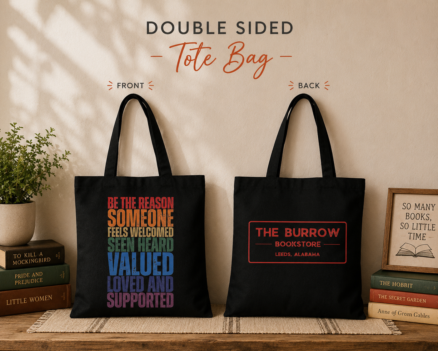 Black double-sided canvas tote bag featuring the inspirational "Be the Reason Someone Feels Welcomed, Seen, Heard, Valued, Loved and Supported" design on the front and The Burrow Bookstore logo on the back.