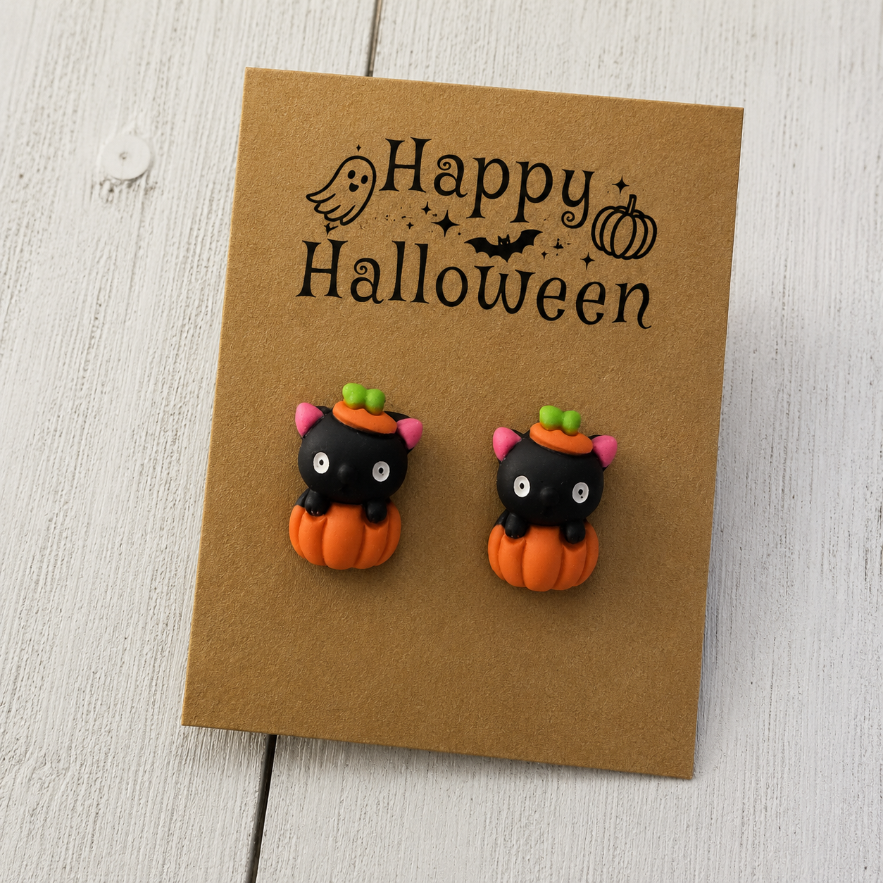 Black cat in orange pumpkin resin stud earrings for Halloween