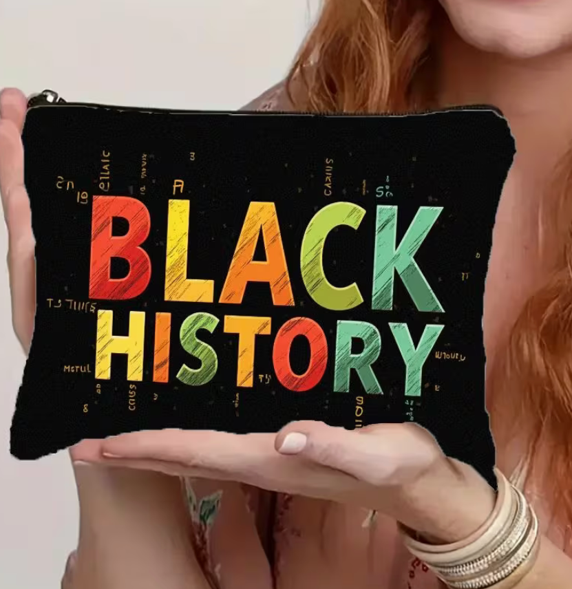 Woman holding Black History makeup bag with multicolor lettering on black background