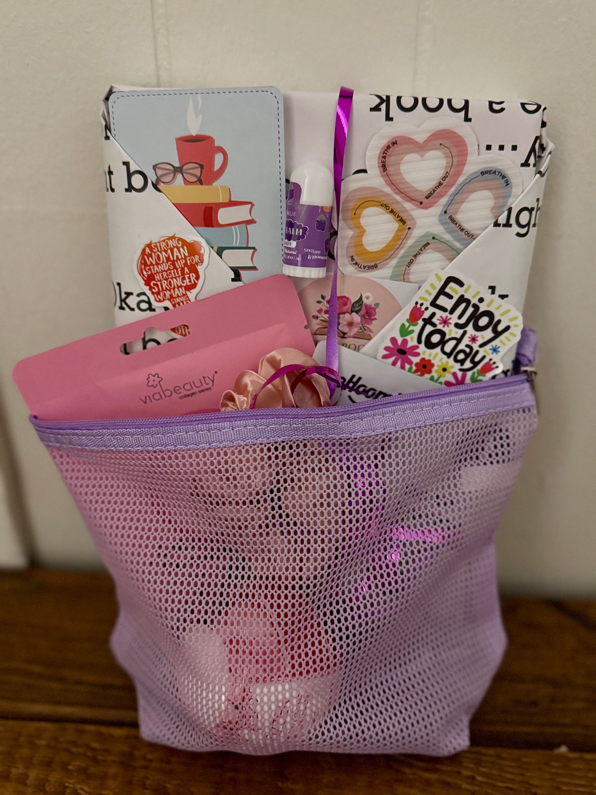 Wrapped blind date with a book featuring humorous essays about motherhood, laughter, and real life, perfect for adult women readers