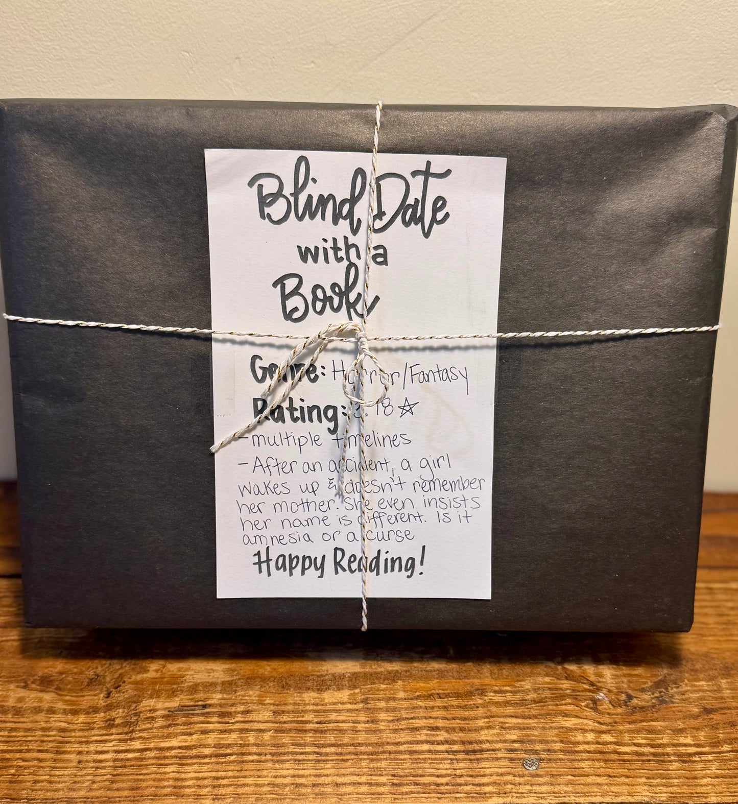 A Blind Date with a Book package featuring a wrapped book, perfect for book lovers, available in all genres and various budgets.