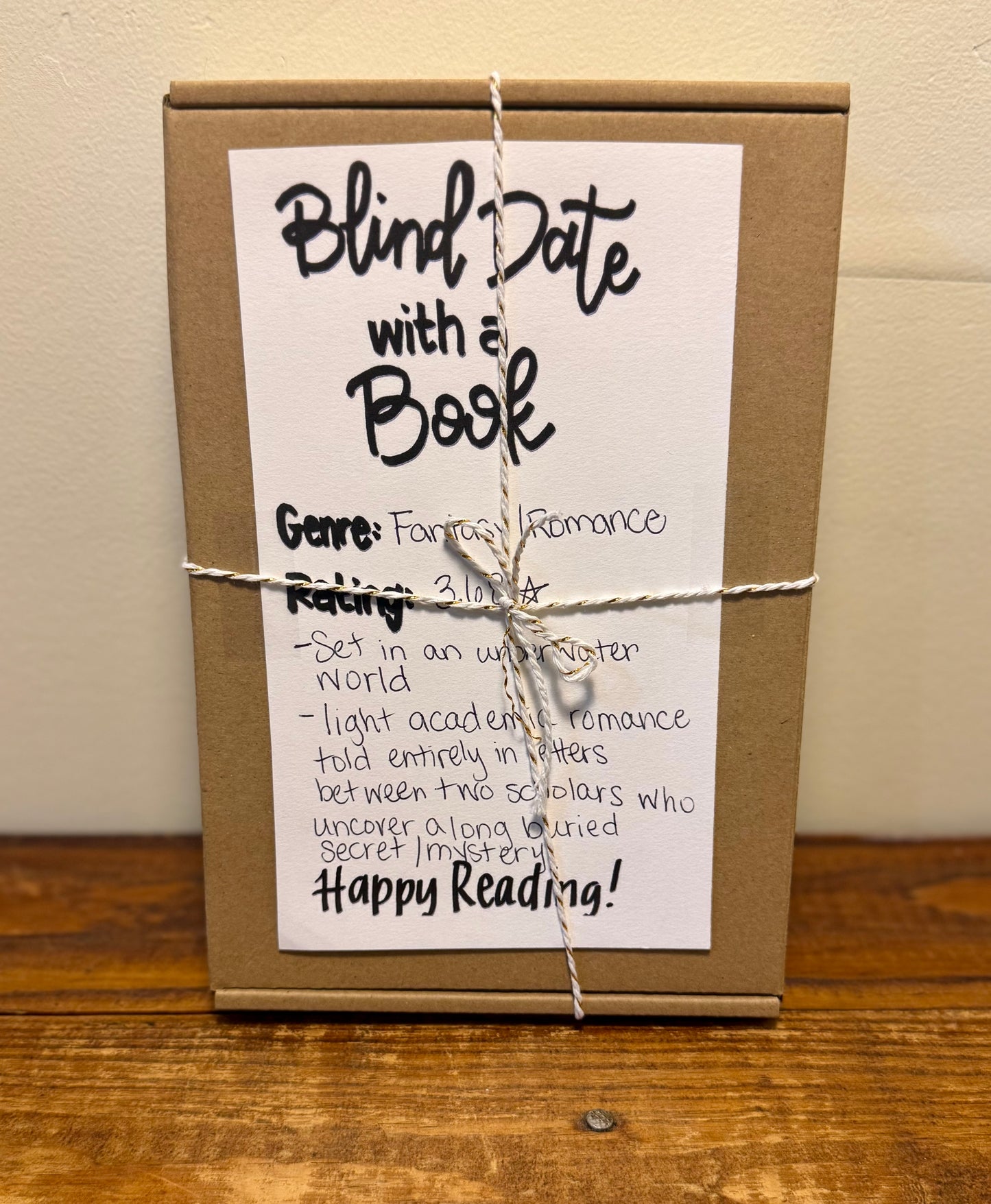 A Blind Date with a Book package featuring a wrapped book, perfect for book lovers, available in all genres and various budgets.