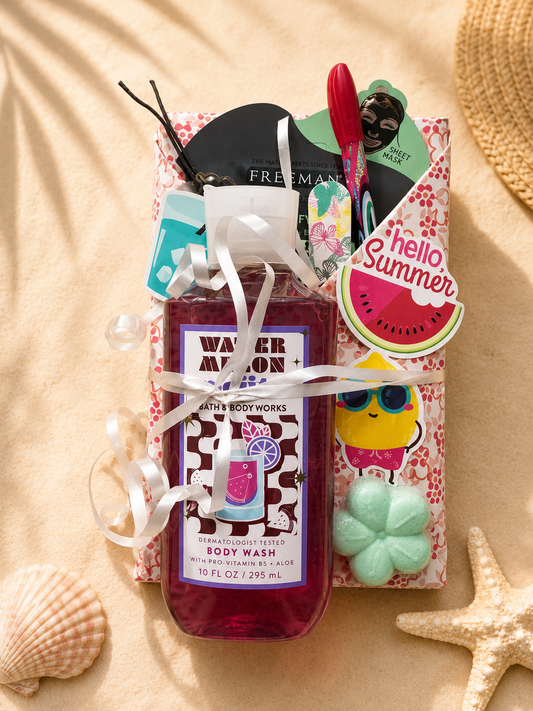Summer-themed Blind Date with a Book package wrapped with beach-inspired stickers, body wash, bookish accessories, and colorful vacation-themed extras on a sandy background
