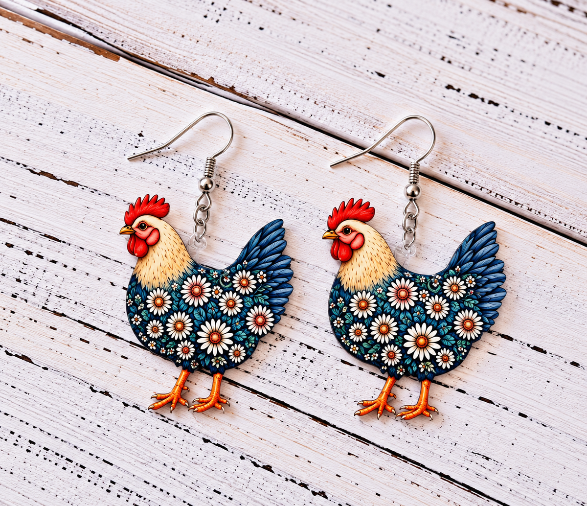 Blue floral chicken acrylic dangle earrings featuring white daisies and silver-tone hooks