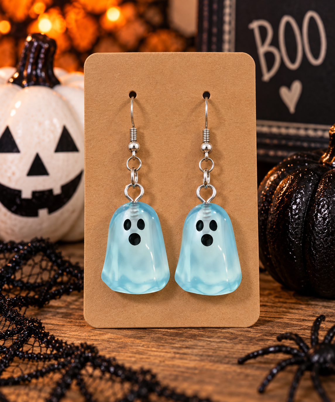 Light blue translucent ghost dangle earrings for Halloween