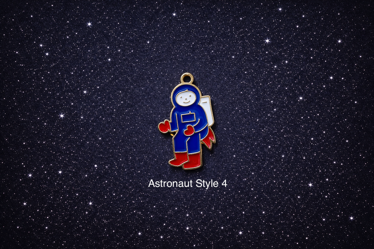 Blue standing astronaut enamel charm with red boots, red gloves, and a small backpack, photographed on a dark starry background and sold individually.