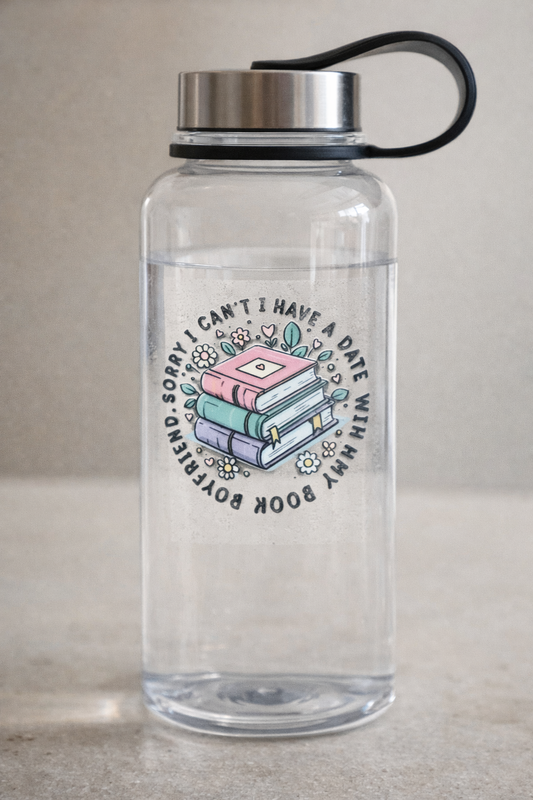 2 inch UV-DTF sticker with stacked pastel books and the phrase “Sorry, I can’t, I have a date with my book boyfriend,” shown applied to a clear water bottle, suitable for water bottles or phone cases.