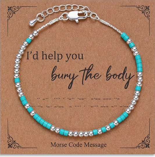 Blue and silver Morse code bracelet displayed on a kraft message card that reads I’d help you bury the body.