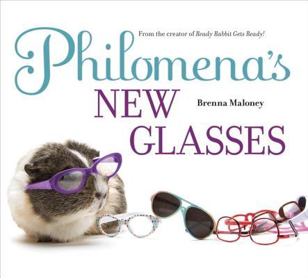 Book cover of 'Philomena's New Glasses' with a guinea pig wearing glasses and multiple pairs of glasses.