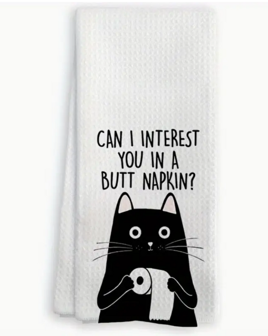 White towel with black cat graphic and text 'Can I interest you in a butt napkin?'