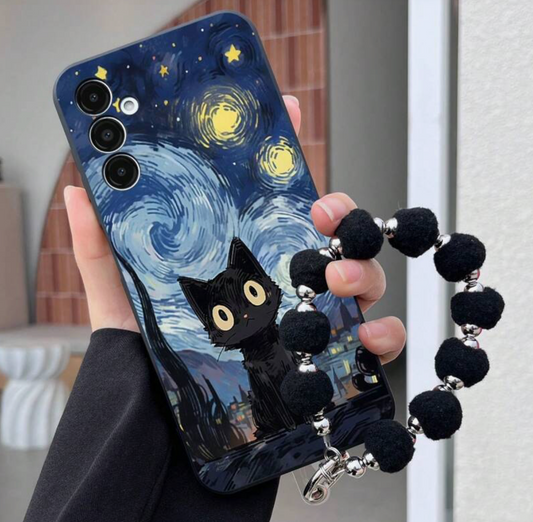 Phone case with 'Starry Night' design and black cat charm held by a person.