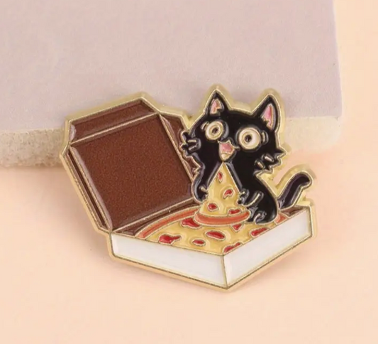 Cat and Pizza enamel pin featuring a black cat holding a slice of pizza inside a pizza box, cute and funny accessory for cat and food lovers