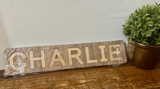 Custom wooden name puzzle personalized with the name Charlie, handmade and perfect for kids’ learning and play.