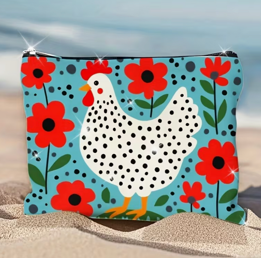 cute chicken floral makeup bag with spotted white hen and bright red flower design on blue background in retro farmhouse style
