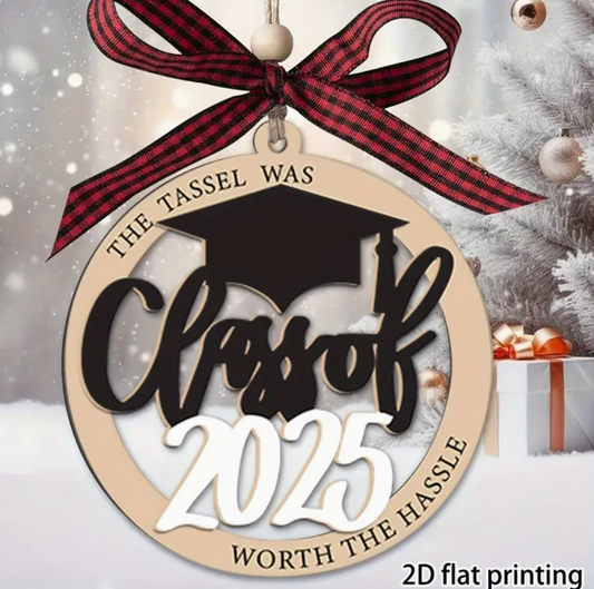 Wooden 2D Christmas tree ornament featuring a graduation hat, Class of 2025, and the phrase The Tassel Was Worth the Hassle.