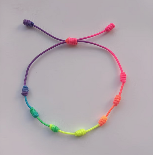Colorful rainbow seven knot anklet with adjustable cord and bright gradient design