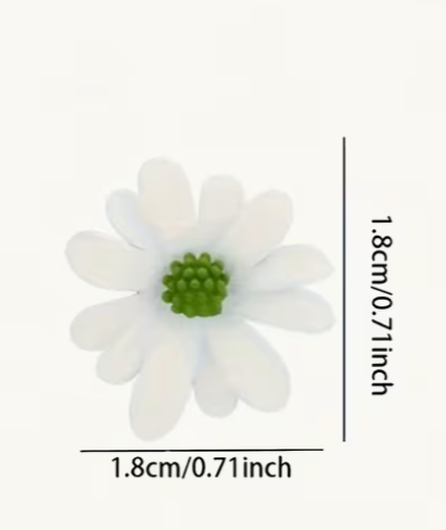 White daisy earring showing size measurement and green center detail