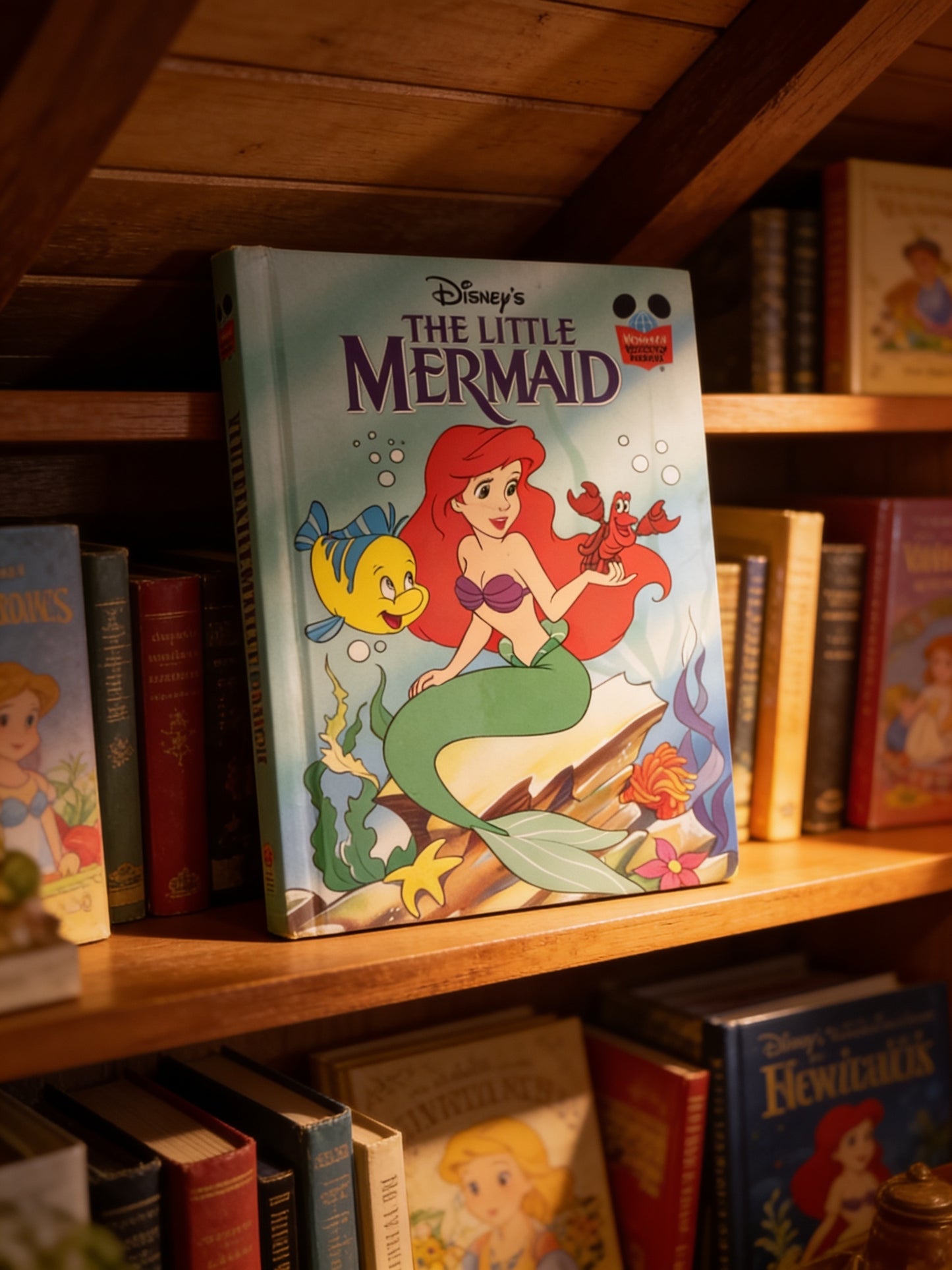 Cover of Disney's The Little Mermaid from Grolier Book Club, a children's storybook featuring Ariel, underwater adventures, ocean friends, and the classic Disney tale of dreams, courage, and friendship.