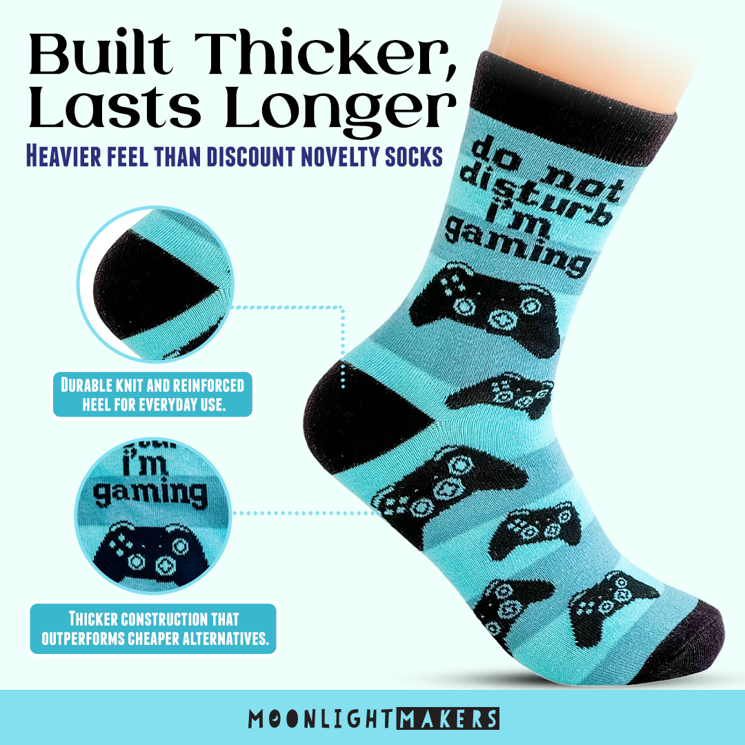 Promotional graphic showing Do Not Disturb I’m Gaming blue crew socks on a model foot, highlighting thicker construction and reinforced heel for durability, with Moonlight Makers branding.