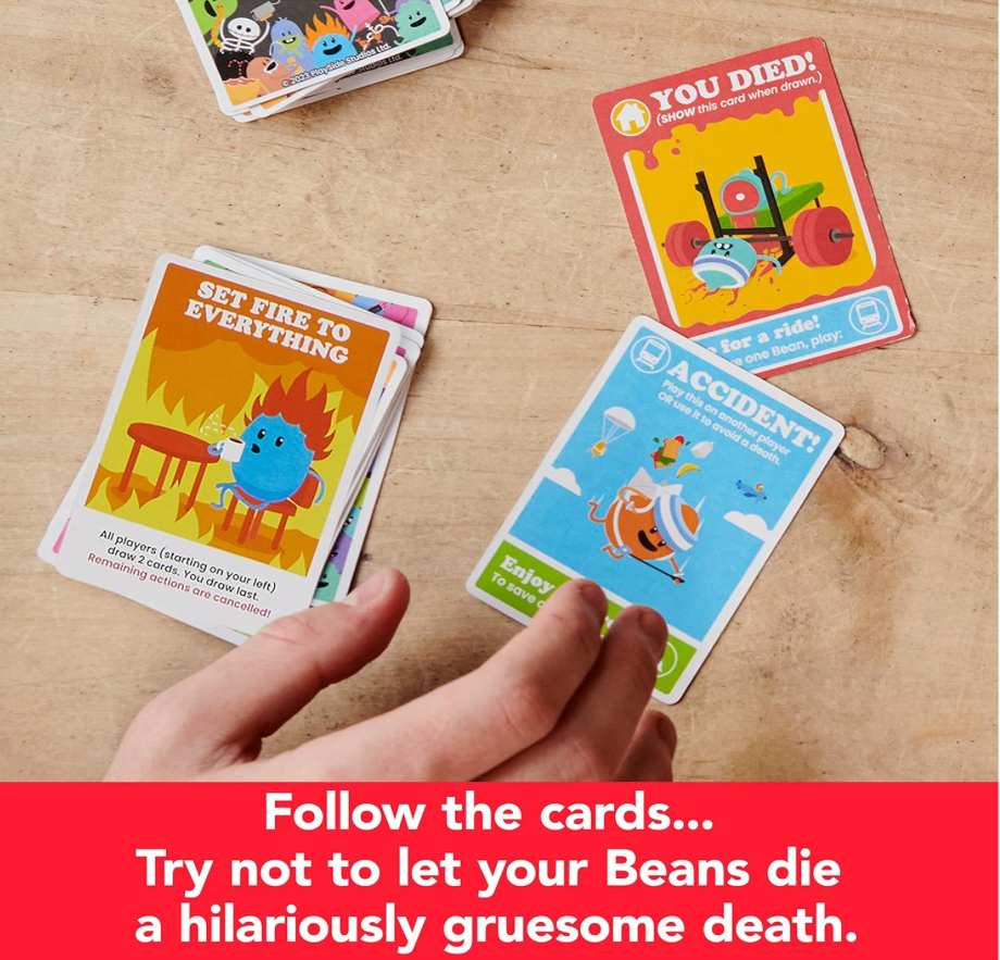 Gameplay from the Dumb Ways to Die card game showing You Died, Accident, and Set Fire to Everything cards during a fast-paced round