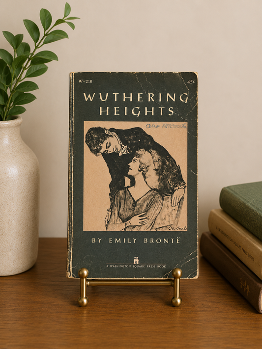 Vintage 1961 Washington Square Press paperback edition of Wuthering Heights by Emily Brontë with illustrated romantic cover art