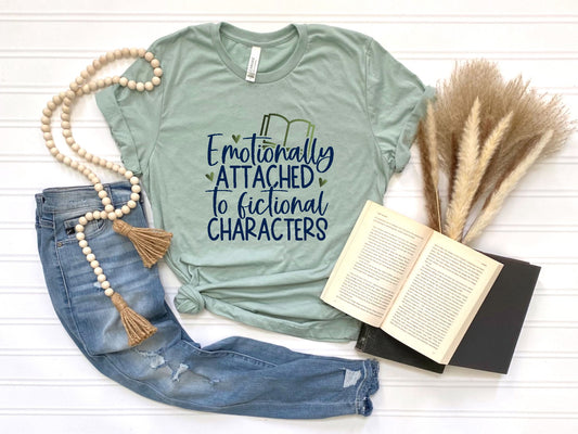 Short-sleeve t-shirt with the phrase Emotionally Attached to Fictional Characters, perfect for book lovers.