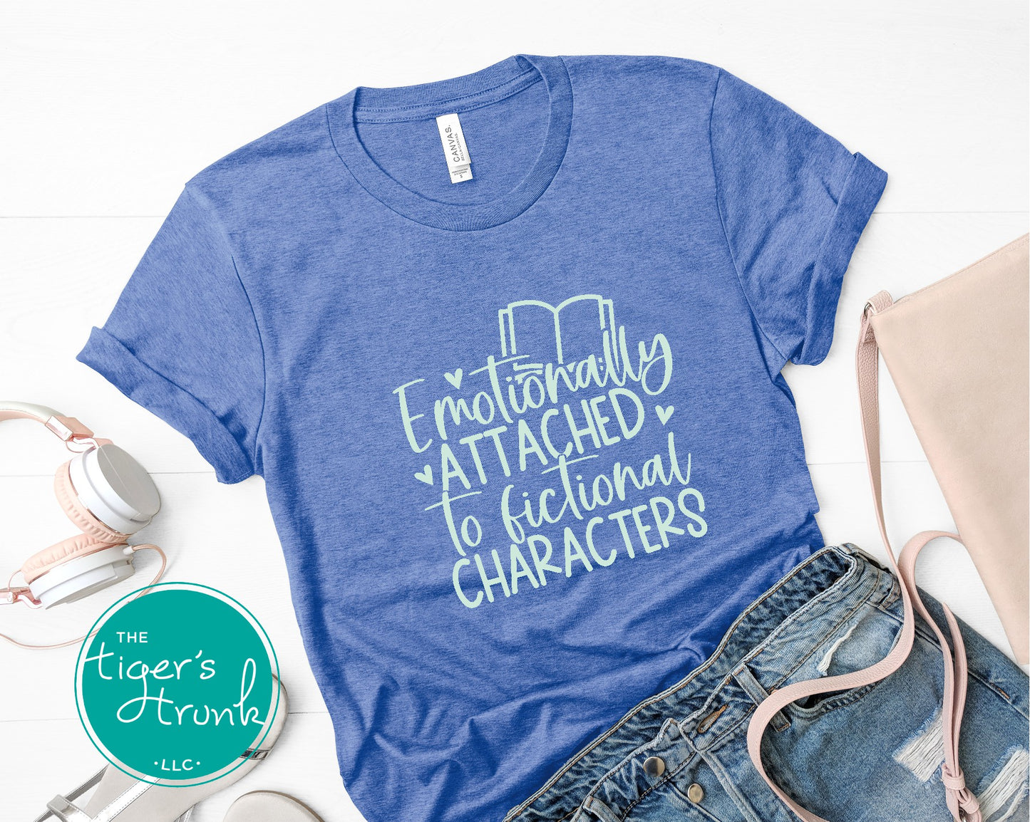 Blue t-shirt with 'Emotionally Attached to Fictional Characters' text on a white background