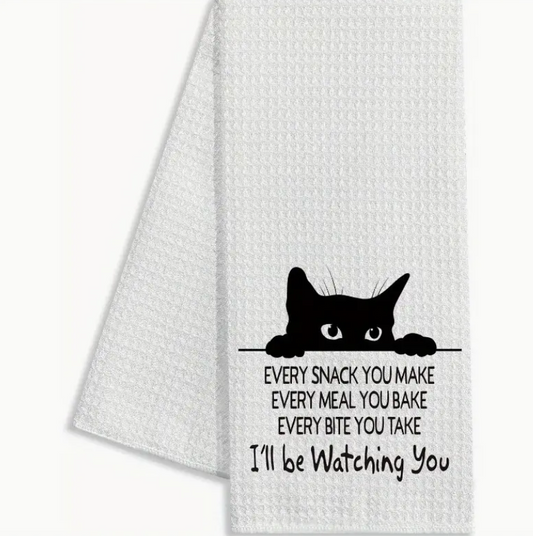 White towel with black cat design and text on a white background