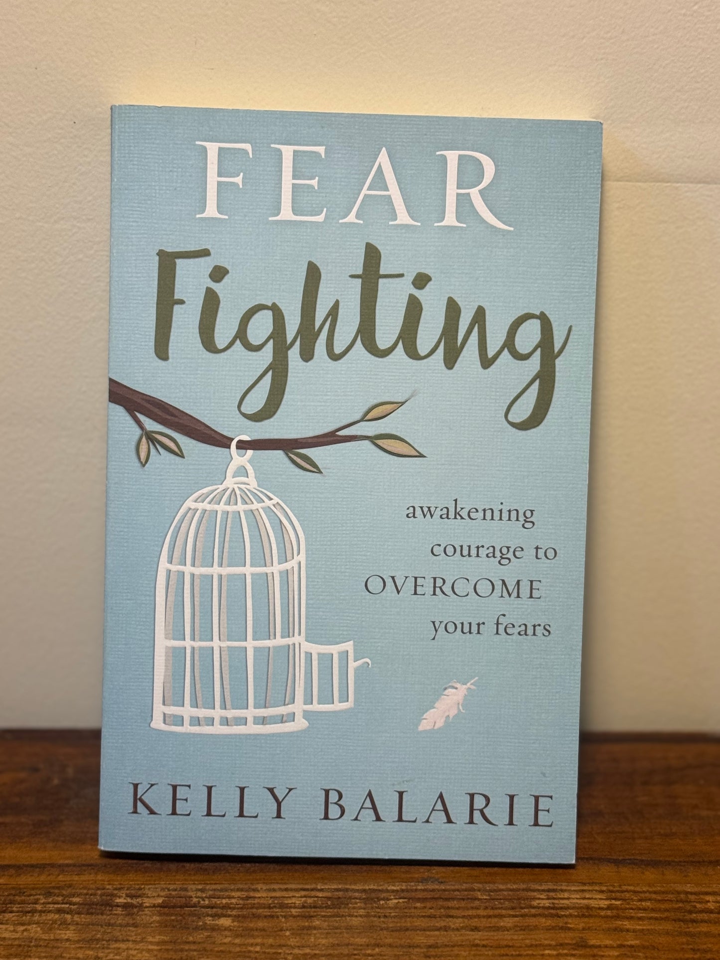 Paperback copy of Kelly Valarie’s Fear Fighting in like new condition, an inspirational faith-based book.